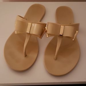 Michael kors nude color bow sandals.